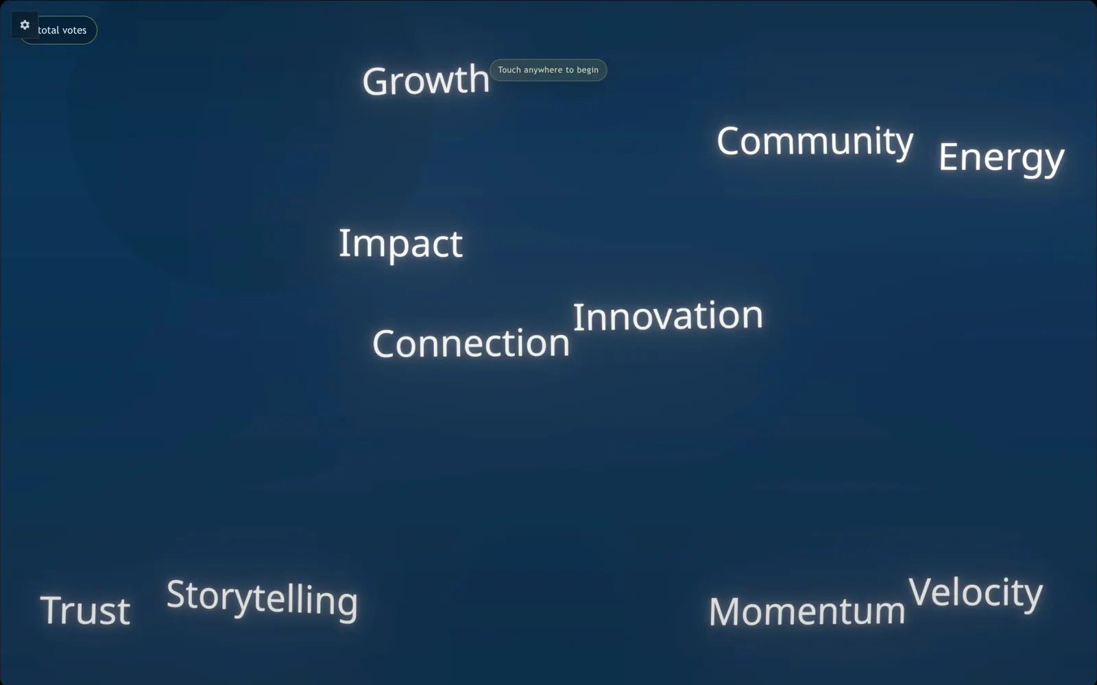 Word Cloud attract screen with floating words on a large display